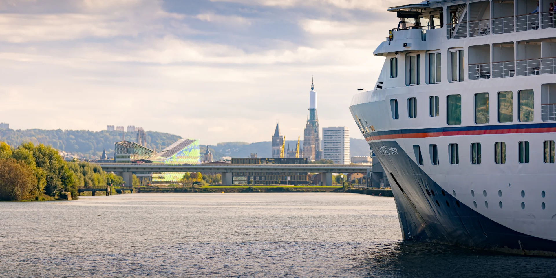 Cruise ship arriving in Rouen on the Seine River