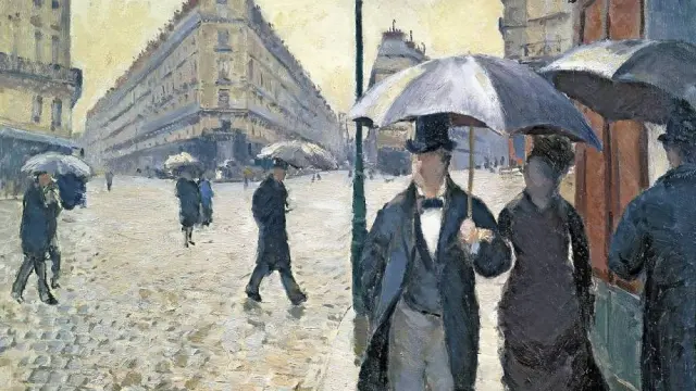 Rue de Paris. Temps de pluie, Gustave Caillebotte rend palpables les reflets de la pluie sur les pavés et la toile lustrée des parapluies. © Musée Marmottan Monet