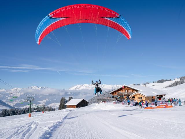 Paragliding above the ski slopes