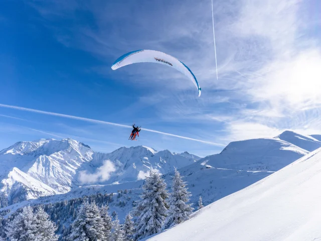 Paragliding above the ski slopes