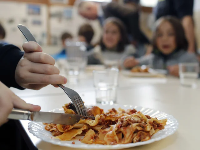 Primary school. The canteen with vegan meal.  Saint Gervais les Bains. France.