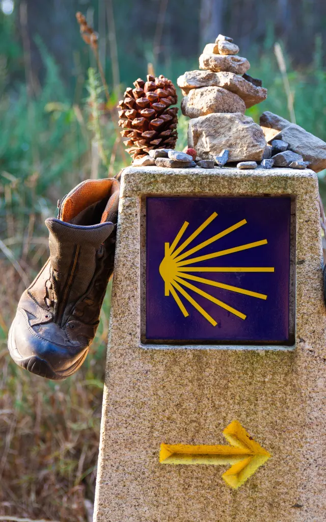 Hiking boots on the stone signal