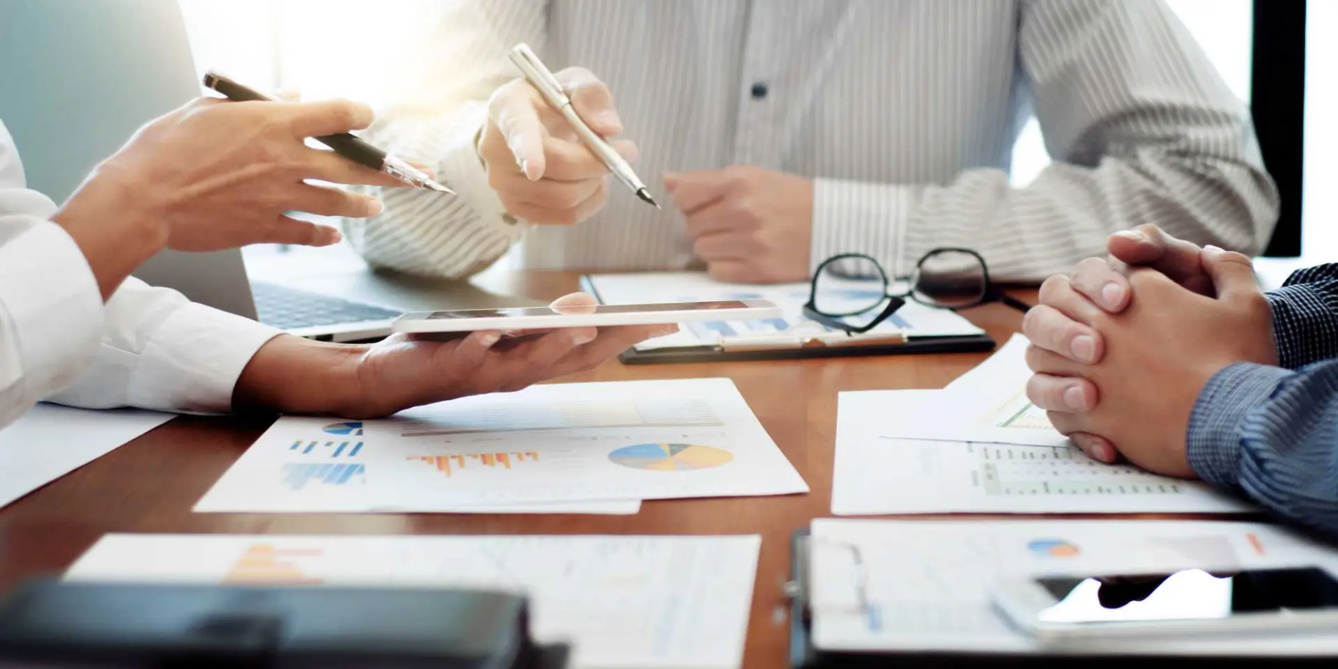 business executives consulting negotiation meeting in office.