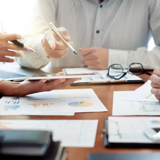 business executives consulting negotiation meeting in office.