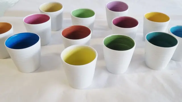 Where to buy Limoges porcelain: colourful cups from the Carpenet boutique in Limoges