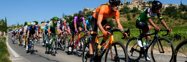 Cyclists pass the village of Faucon during the 2020 Mont Ventoux denivelé challenges.