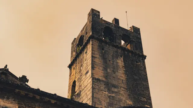 The stone watches over the town.