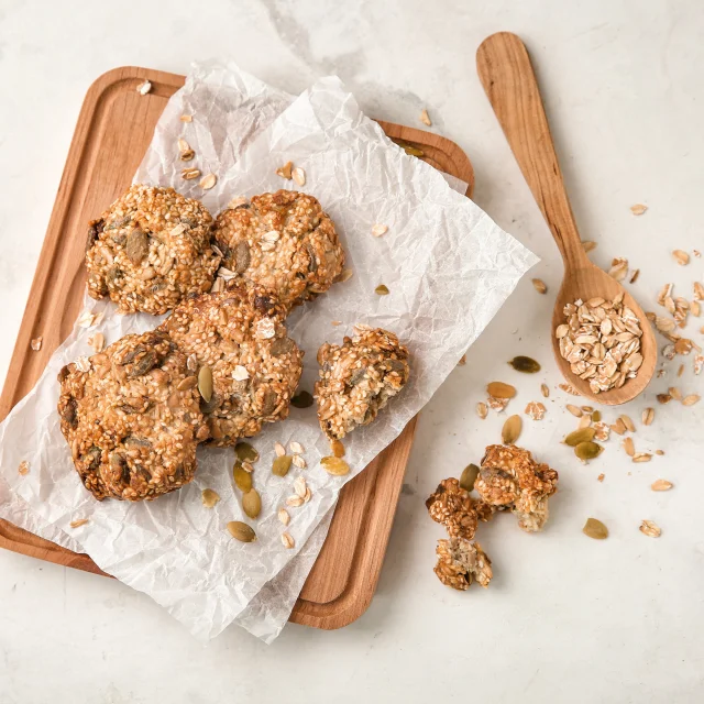 Composition with delicious oatmeal cookies on light background