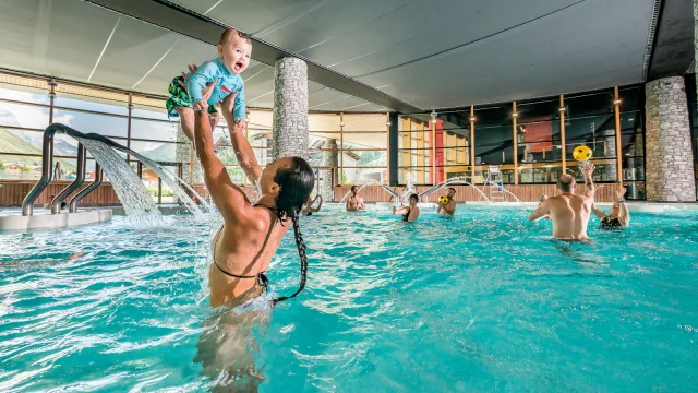 Mom and baby at the Centre Aquasportif in Val d'Isère