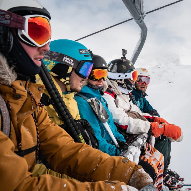 Off-piste day, chairlift; group of friends