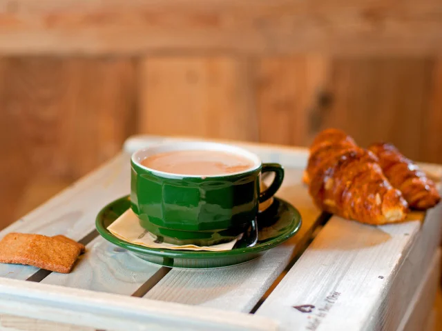 Coffee and croissant at Maison Chevallot in Val d'Isère