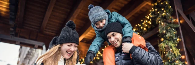 Family and children having fun in the village at Val d'Isère