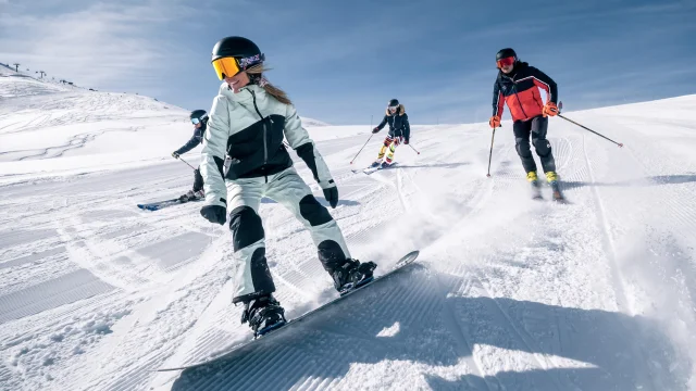 Skiers and snowboarders on the slopes of Val d'Isère