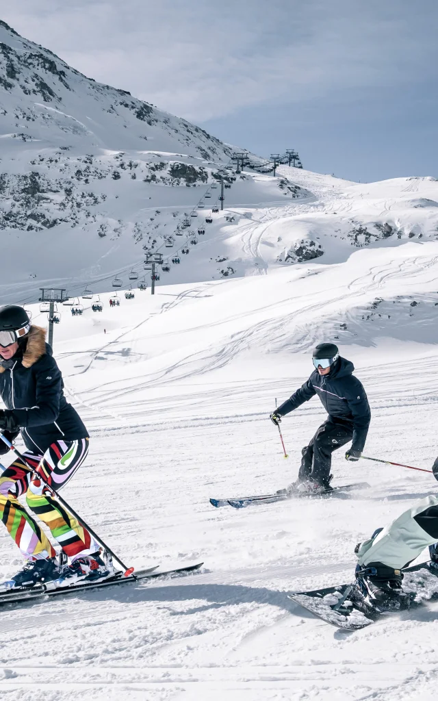 Skiers and snowboarders on the slopes of Val d'Isère