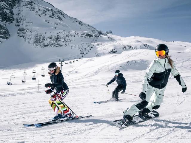 Skiers and snowboarders on the slopes of Val d'Isère