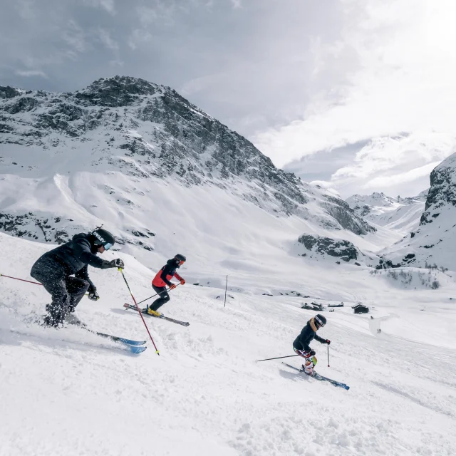 Skiers and snowboarders on the slopes of Val d'Isère