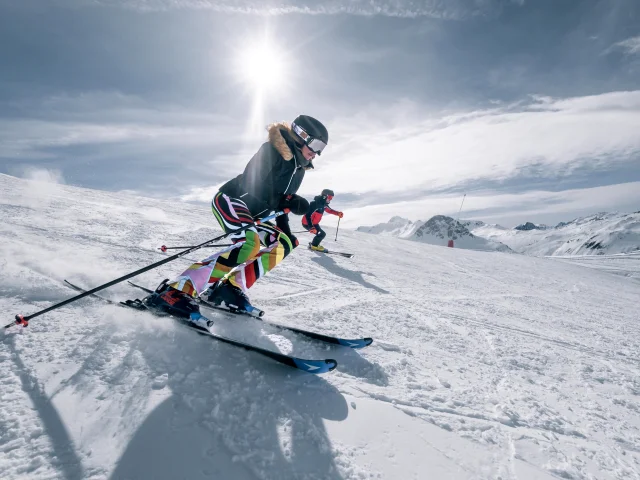 Skiers and snowboarders on the slopes of Val d'Isère