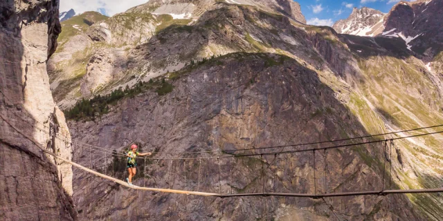 Crossing a via ferrata bridge