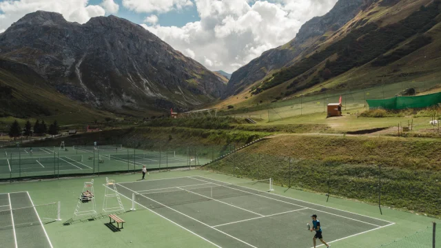 Tennis courts with mountain views in the background