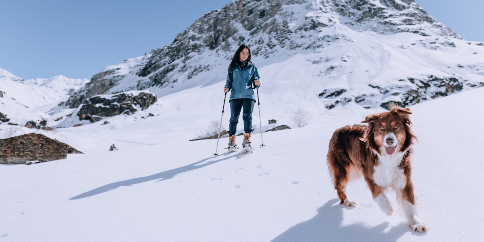 RoseLabeille with her dog on a snowshoe outing