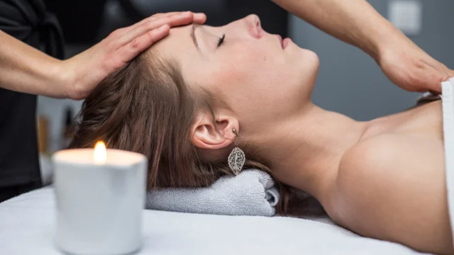 Espace Bien-Etre at the Centre Aquasportif de Val d'Isère with a person receiving a relaxing facial treatment