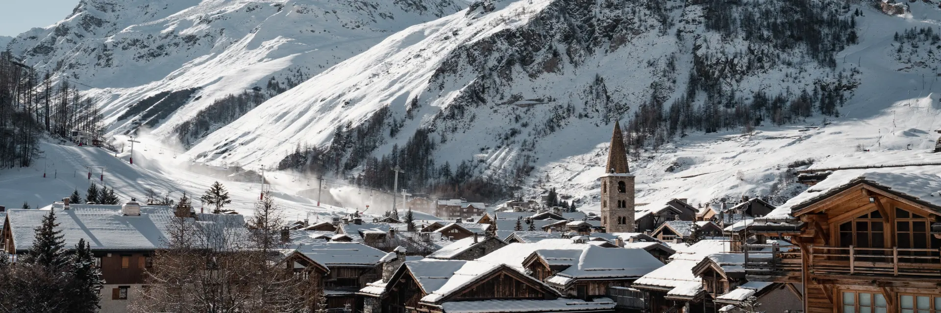 High-up view of the village of Val d'Isère under the winter snow