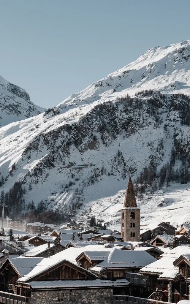 High-up view of the village of Val d'Isère under the winter snow