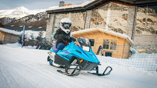 Electric mini snowmobile on the esplanade in winter at Val d'Isère