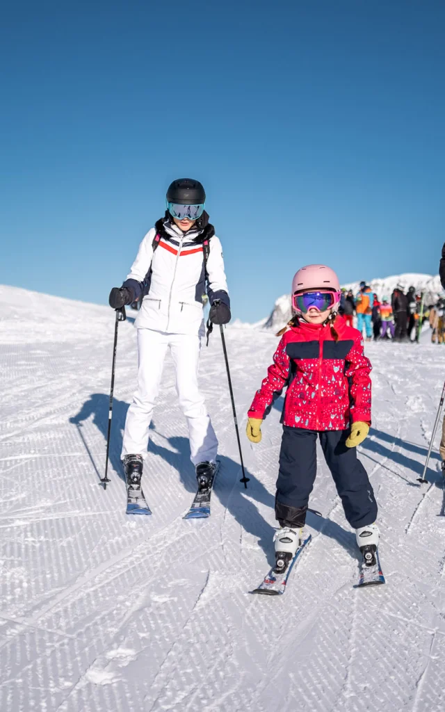 Family skiing at Solaise