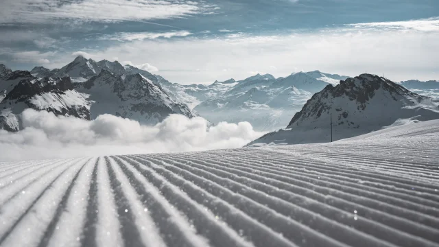 Mountain views with groomed piste in the Bellevarde sector