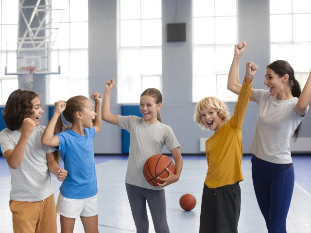 Sport Teacher With His Students
