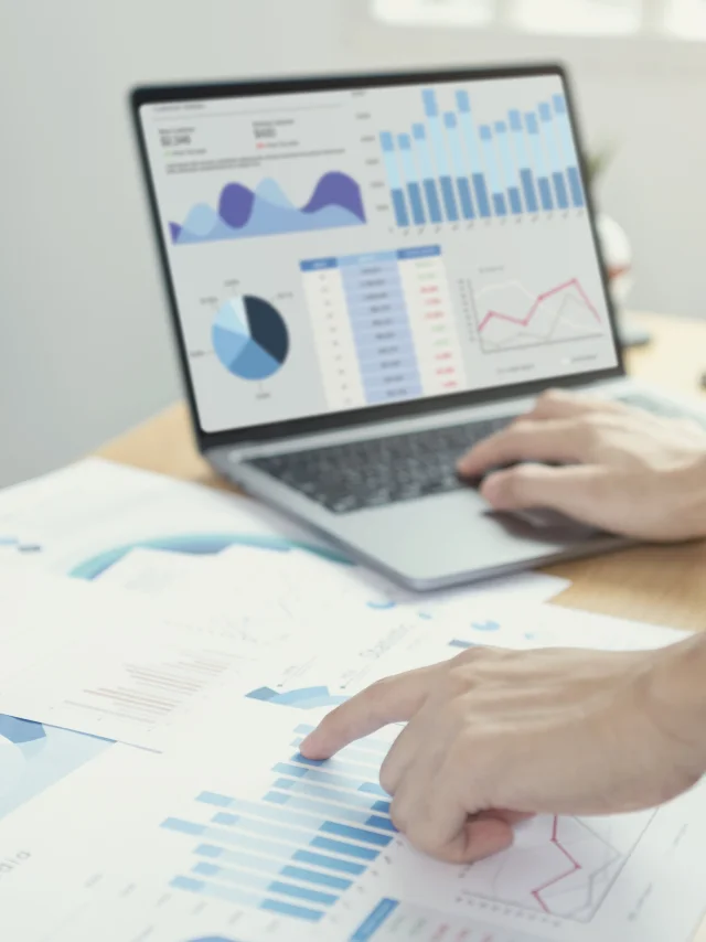 Businesspeople working in finance and accounting Analyze financial graph budget and planning for future in office room.