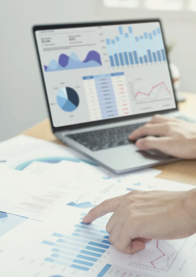 Businesspeople working in finance and accounting Analyze financial graph budget and planning for future in office room.