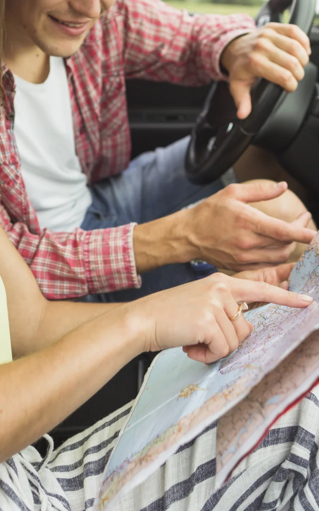 Couple Sitting Car Pointing Finger Location Navigation Map