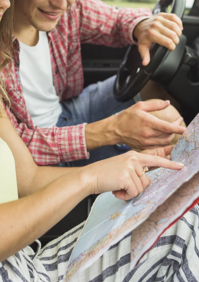 Couple Sitting Car Pointing Finger Location Navigation Map
