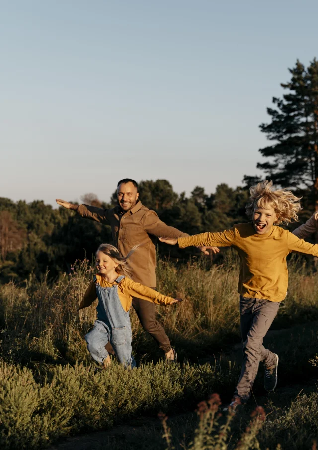 Full Shot Family Running Meadow