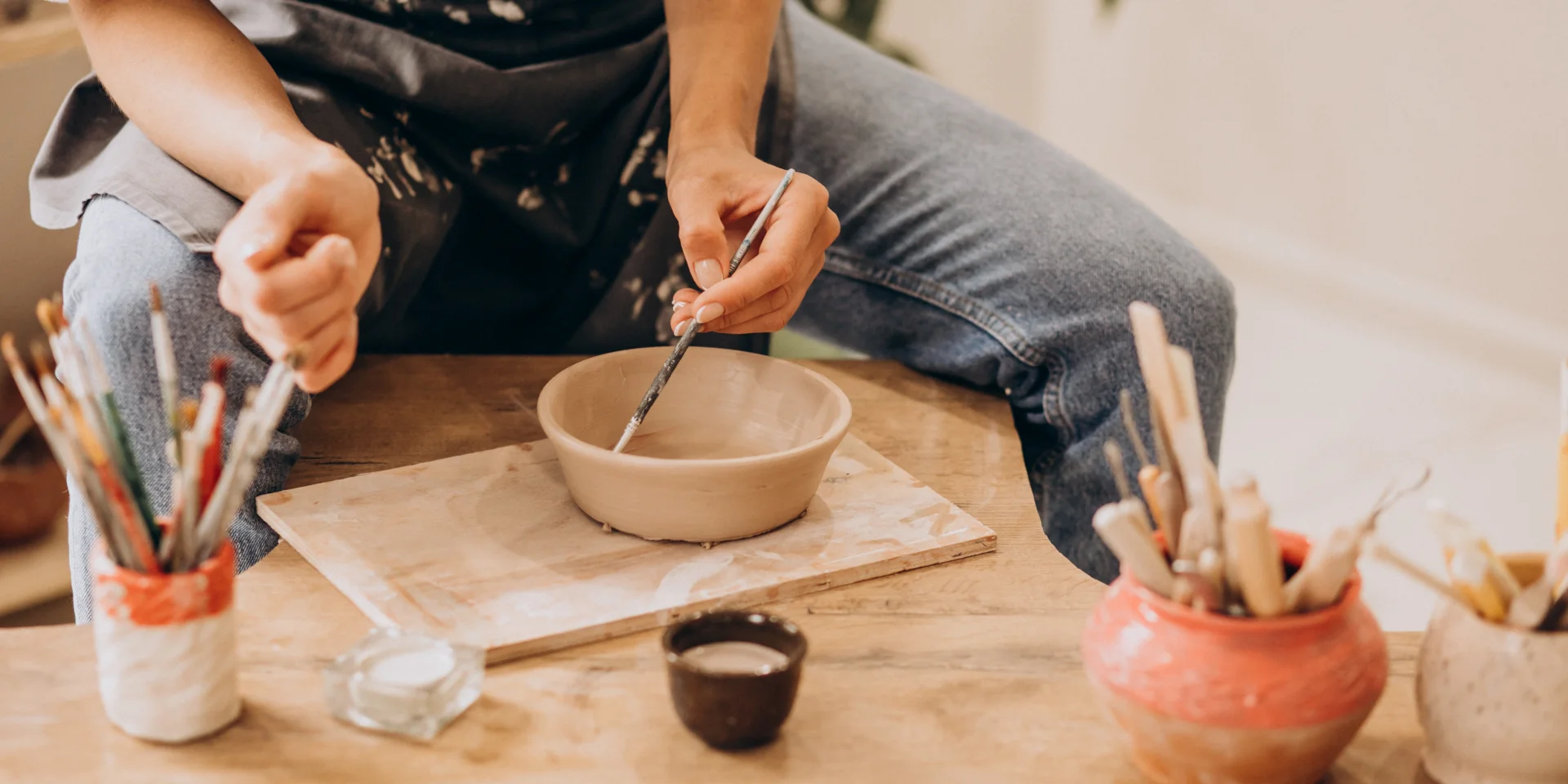 Woman craftmaster at a pottery shop